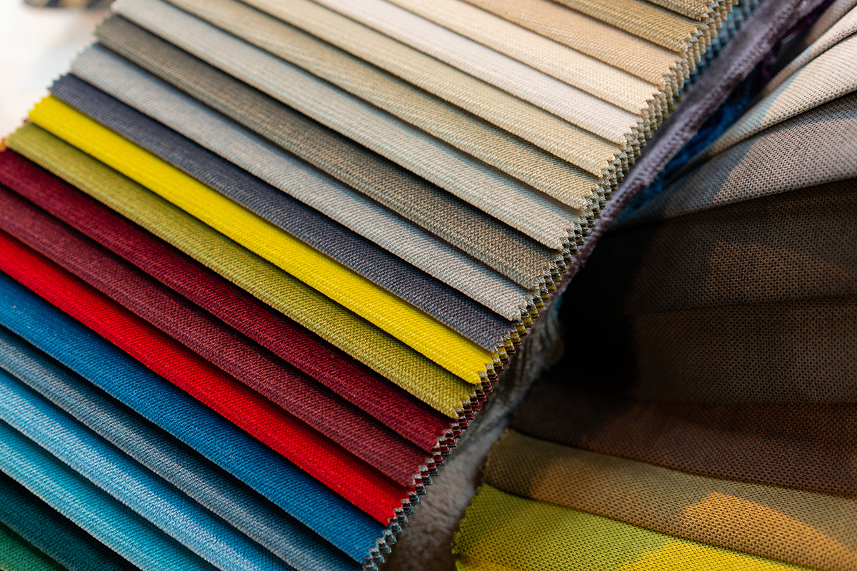 Tissue Catalog. Catalog Of Multi Colored Fabric Samples.